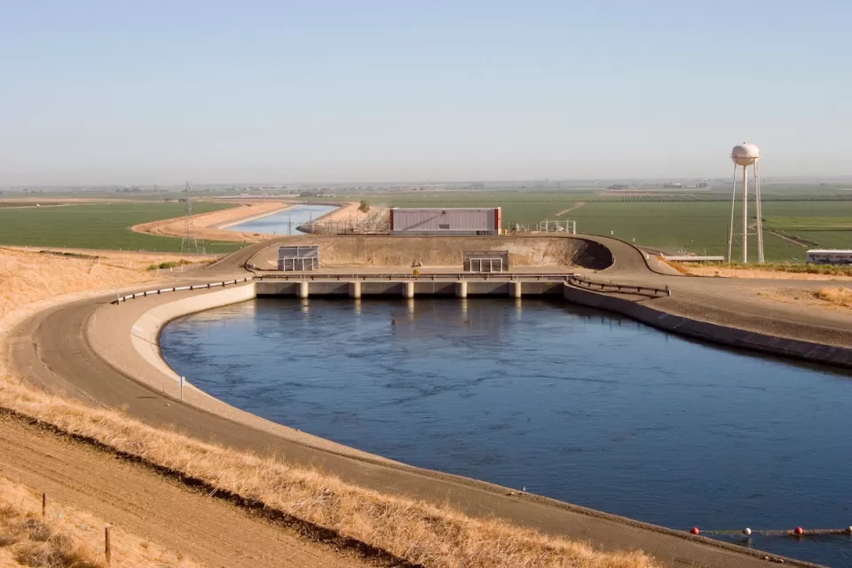 California Aqueduct channel in flat farmland area.